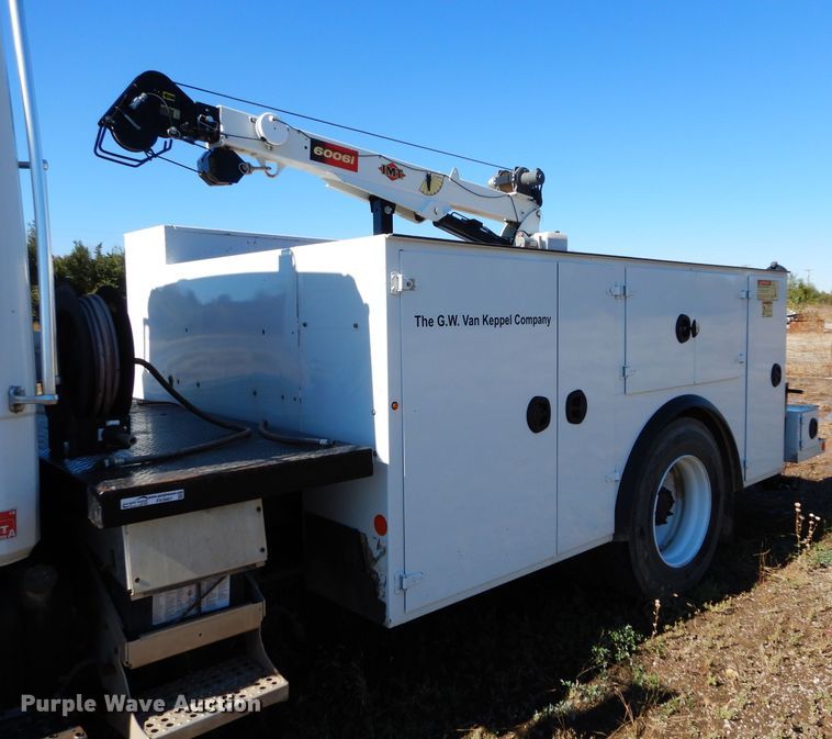 image for item FK9967 2004 Freightliner FL70 utility bed truck with crane