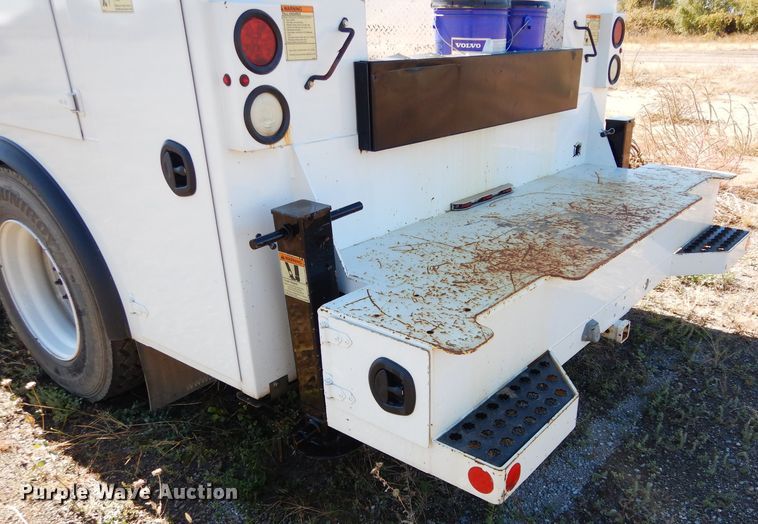 image for item FK9967 2004 Freightliner FL70 utility bed truck with crane