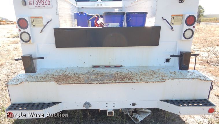 image for item FK9967 2004 Freightliner FL70 utility bed truck with crane