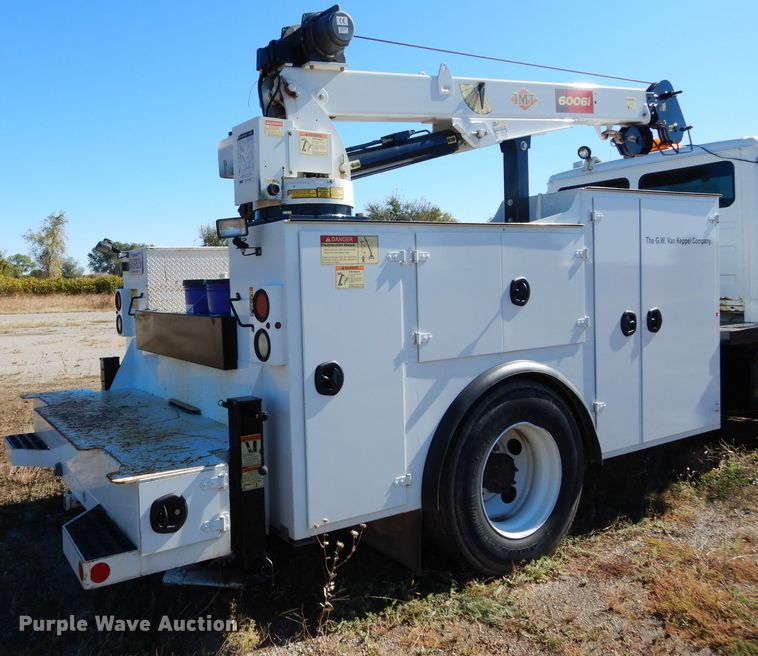 image for item FK9967 2004 Freightliner FL70 utility bed truck with crane