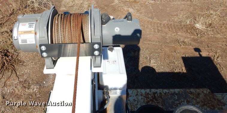 image for item FK9967 2004 Freightliner FL70 utility bed truck with crane