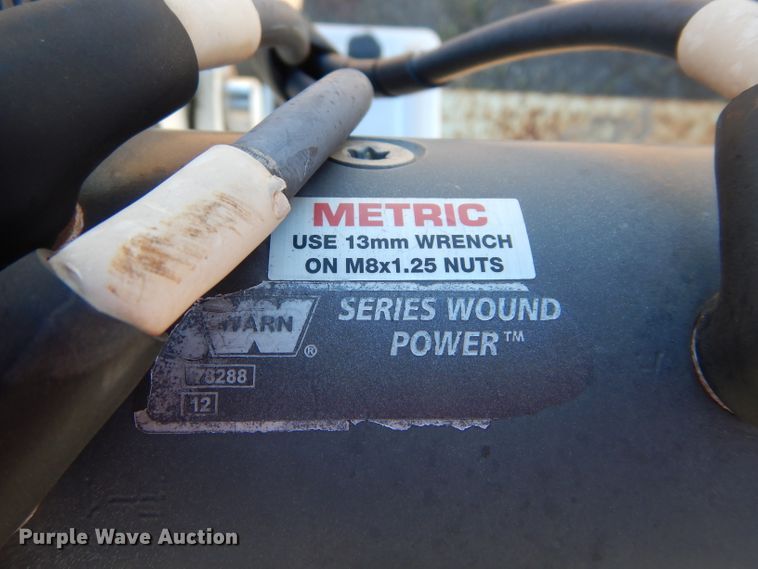 image for item FK9967 2004 Freightliner FL70 utility bed truck with crane