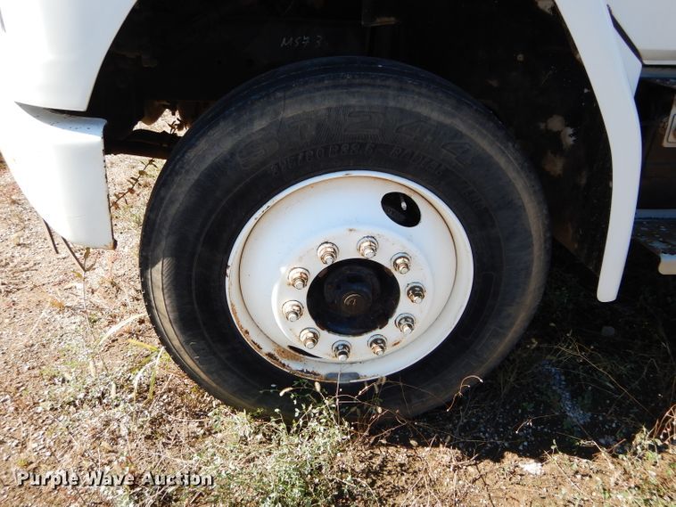 image for item FK9967 2004 Freightliner FL70 utility bed truck with crane