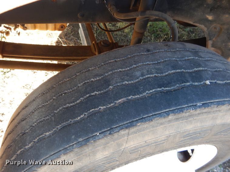 image for item FK9967 2004 Freightliner FL70 utility bed truck with crane