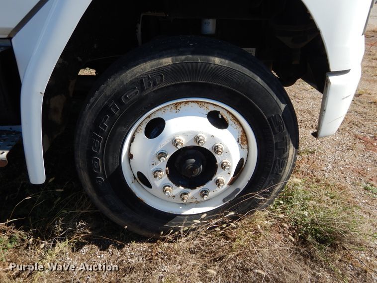 image for item FK9967 2004 Freightliner FL70 utility bed truck with crane