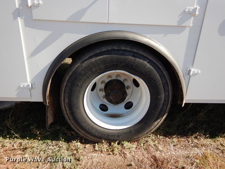 image for item FK9967 2004 Freightliner FL70 utility bed truck with crane