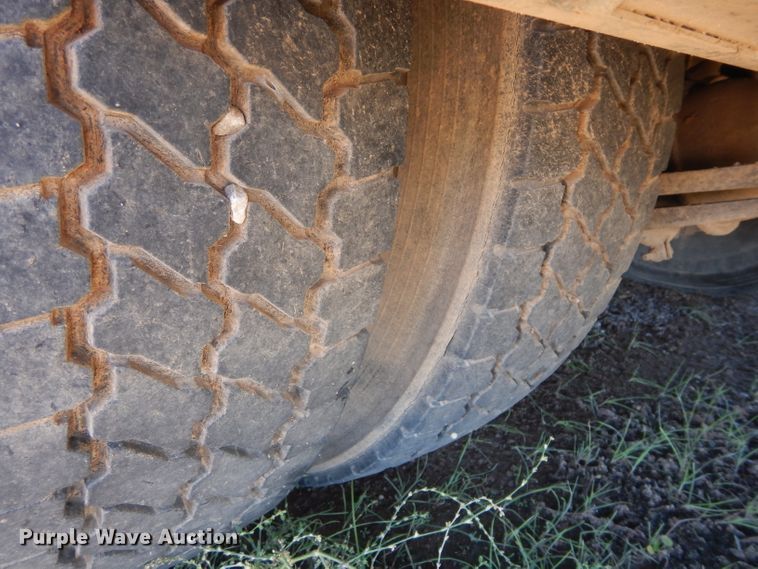 image for item FK9967 2004 Freightliner FL70 utility bed truck with crane