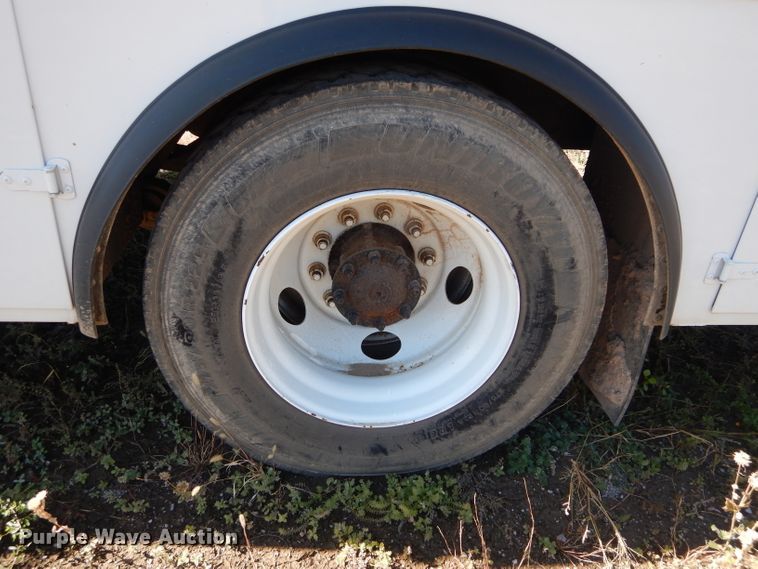 image for item FK9967 2004 Freightliner FL70 utility bed truck with crane