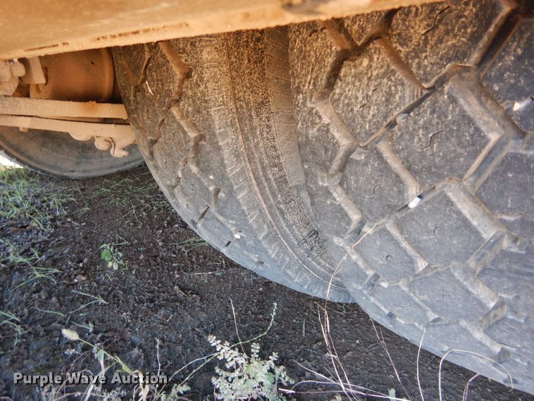 image for item FK9967 2004 Freightliner FL70 utility bed truck with crane