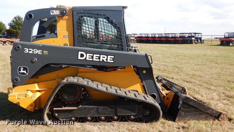 image for item GC9664 2015 John Deere 329E skid steer