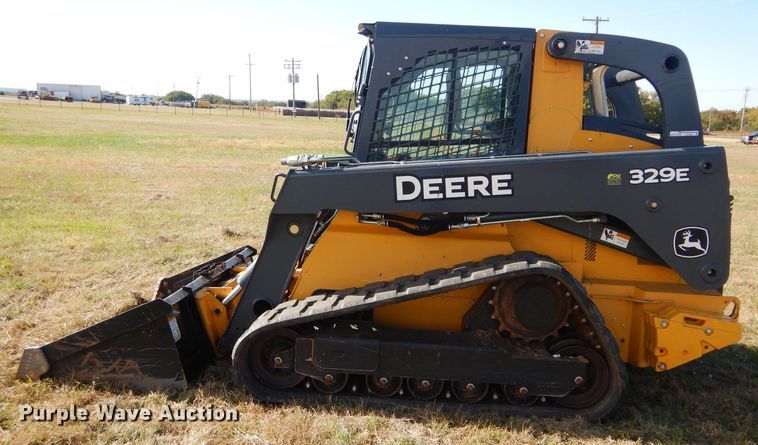 image for item GC9664 2015 John Deere 329E skid steer