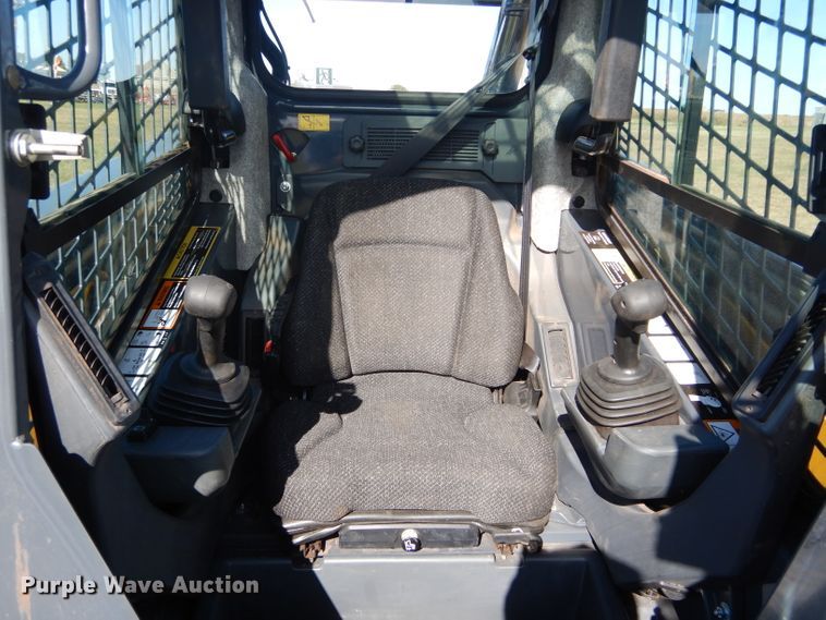 image for item GC9664 2015 John Deere 329E skid steer