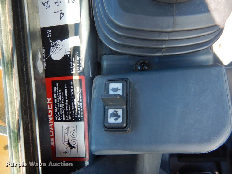 image for item GC9664 2015 John Deere 329E skid steer