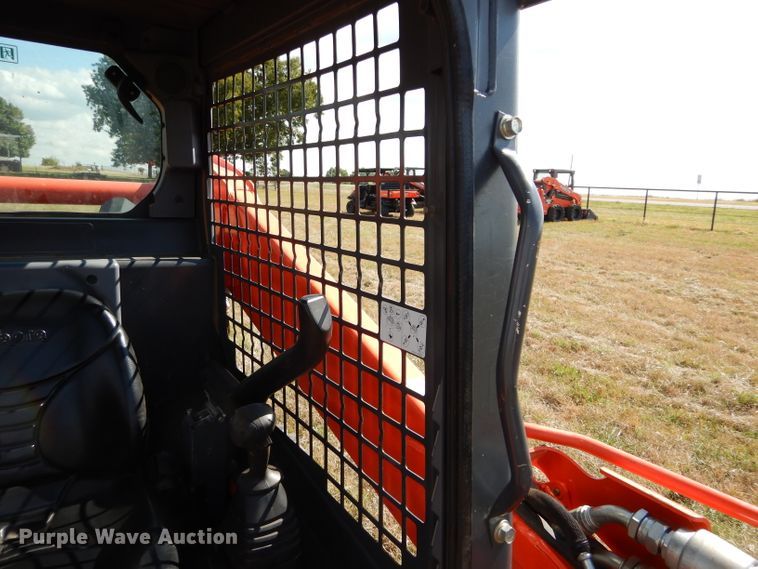 image for item GC9668 2016 Kubota SSV65 skid steer