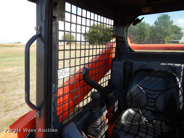 image for item GC9668 2016 Kubota SSV65 skid steer