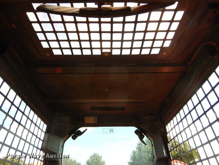 image for item GC9668 2016 Kubota SSV65 skid steer