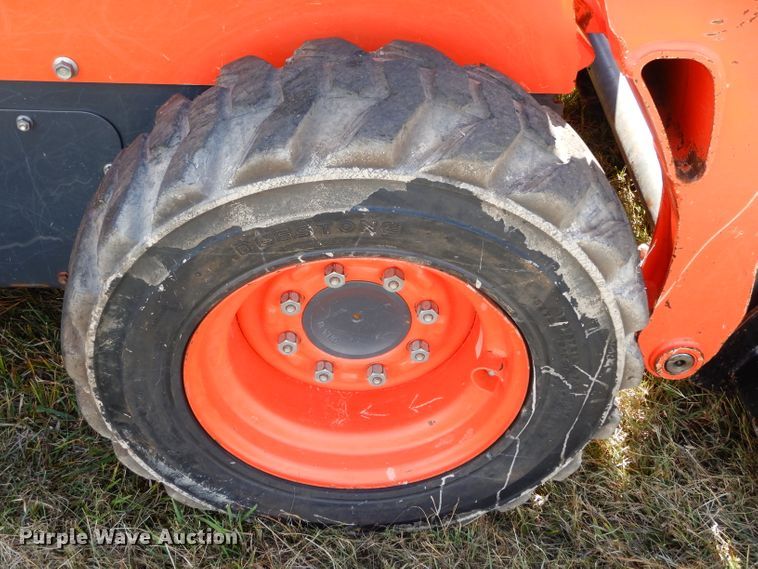 image for item GC9668 2016 Kubota SSV65 skid steer