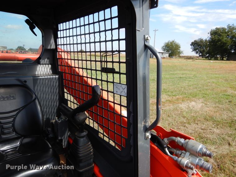 image for item GC9672 2017 Kubota SSV65 skid steer