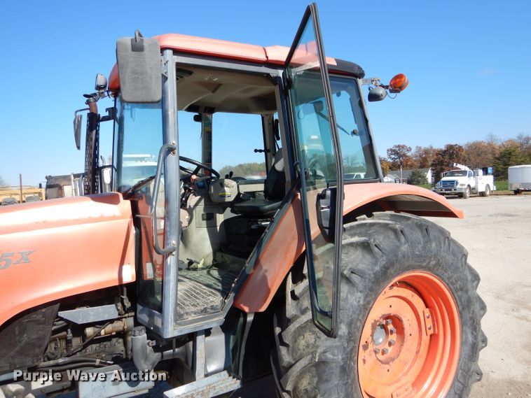 image for item DH6794 Kubota M105X MFWD tractor