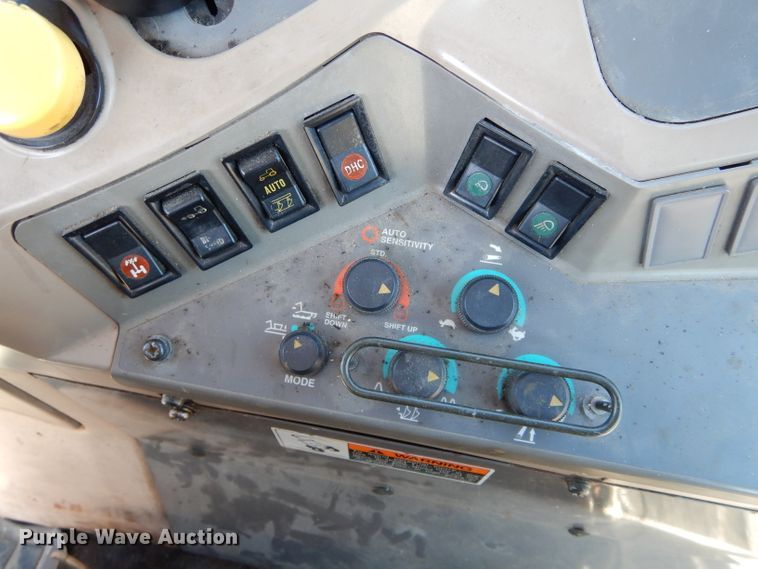 image for item DH6794 Kubota M105X MFWD tractor