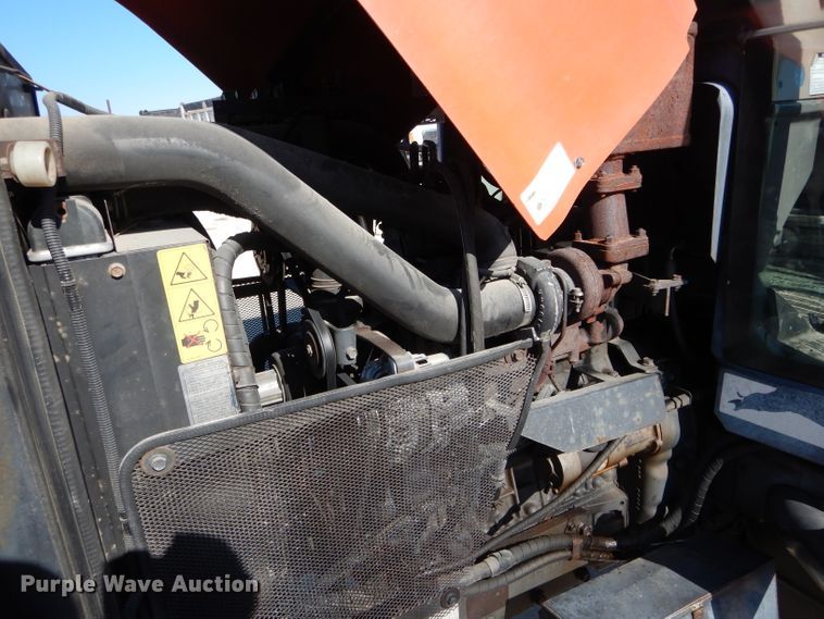 image for item DH6794 Kubota M105X MFWD tractor