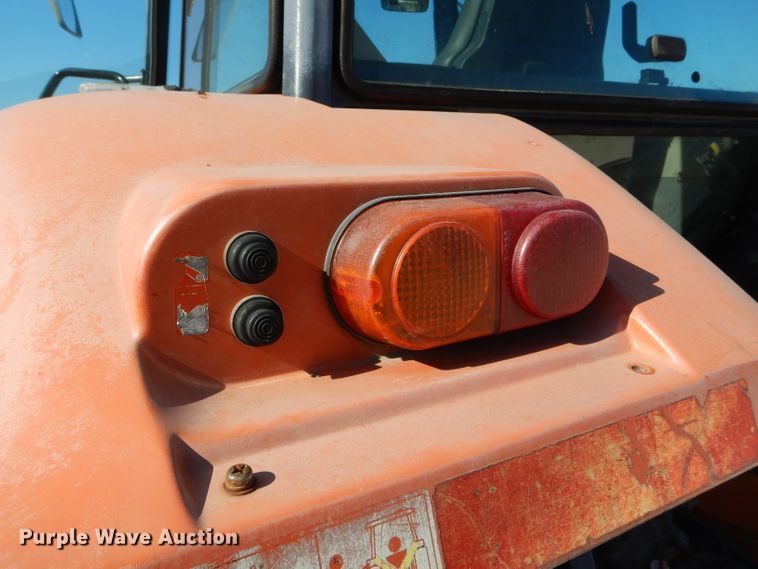 image for item DH6794 Kubota M105X MFWD tractor