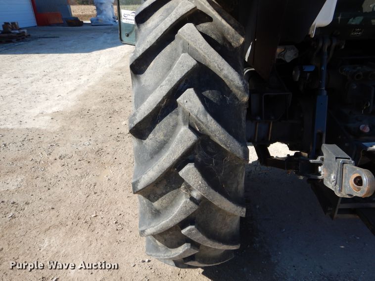 image for item DH6794 Kubota M105X MFWD tractor