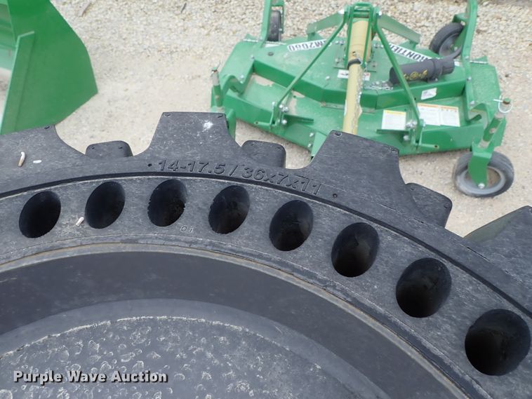 image for item FK9539 (3) 2016 John Deere 14x17.5 solid tires