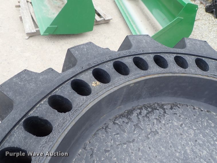 image for item FK9539 (3) 2016 John Deere 14x17.5 solid tires