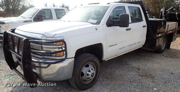 image for item DB7580 2015 Chevrolet Silverado 3500HD Crew Cab flatbed pickup truck