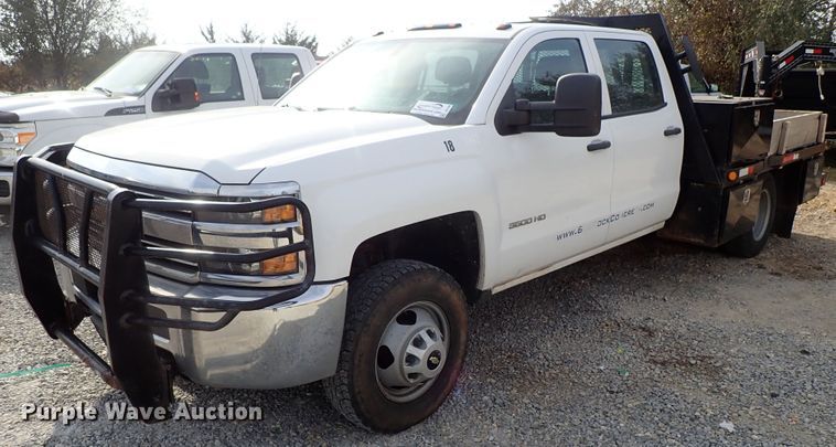 image for item DB7580 2015 Chevrolet Silverado 3500HD Crew Cab flatbed pickup truck