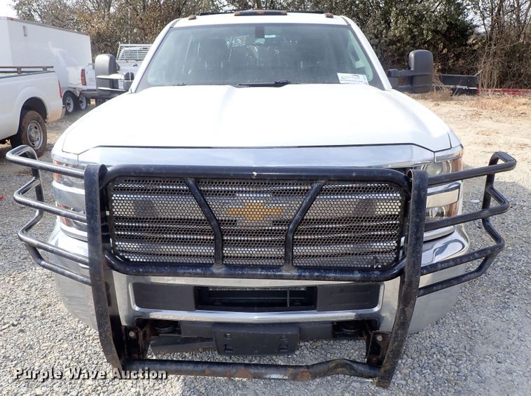 image for item DB7580 2015 Chevrolet Silverado 3500HD Crew Cab flatbed pickup truck