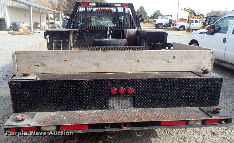 image for item DB7580 2015 Chevrolet Silverado 3500HD Crew Cab flatbed pickup truck