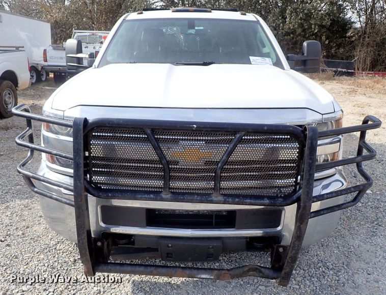 image for item DB7580 2015 Chevrolet Silverado 3500HD Crew Cab flatbed pickup truck
