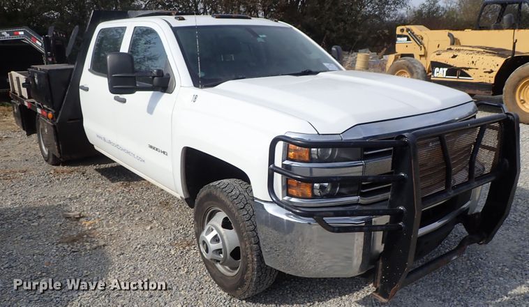 image for item DB7580 2015 Chevrolet Silverado 3500HD Crew Cab flatbed pickup truck