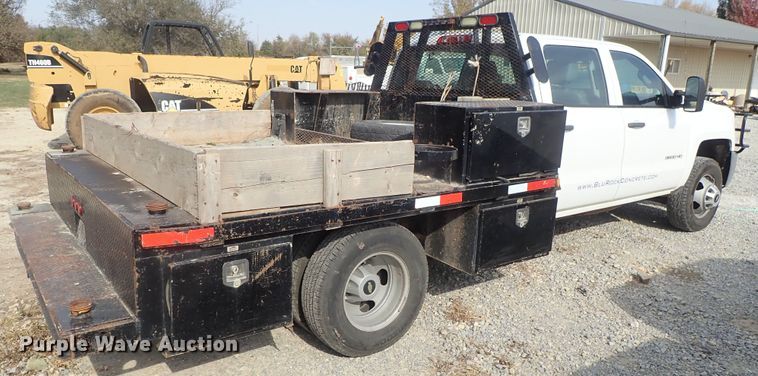image for item DB7580 2015 Chevrolet Silverado 3500HD Crew Cab flatbed pickup truck