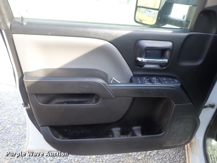 image for item DB7580 2015 Chevrolet Silverado 3500HD Crew Cab flatbed pickup truck