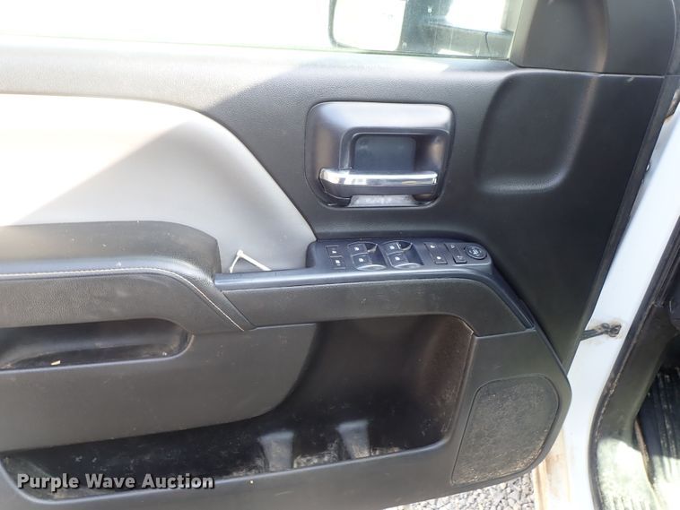 image for item DB7580 2015 Chevrolet Silverado 3500HD Crew Cab flatbed pickup truck