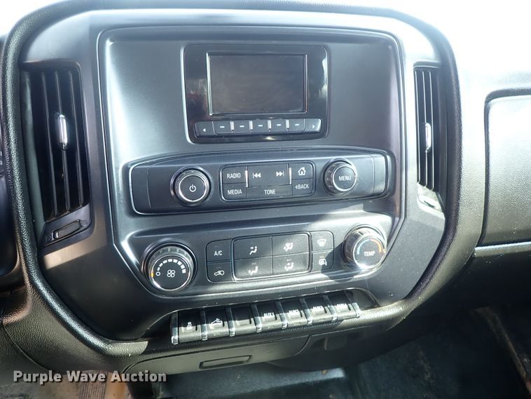 image for item DB7580 2015 Chevrolet Silverado 3500HD Crew Cab flatbed pickup truck