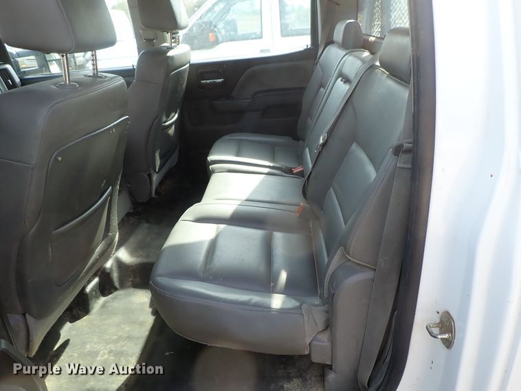 image for item DB7580 2015 Chevrolet Silverado 3500HD Crew Cab flatbed pickup truck