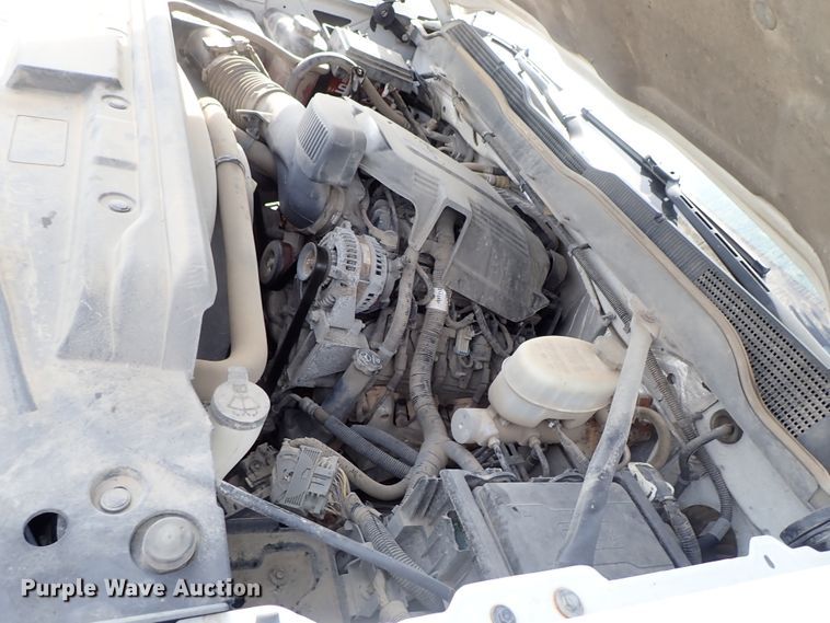 image for item DB7580 2015 Chevrolet Silverado 3500HD Crew Cab flatbed pickup truck