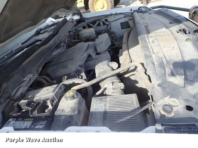 image for item DB7580 2015 Chevrolet Silverado 3500HD Crew Cab flatbed pickup truck