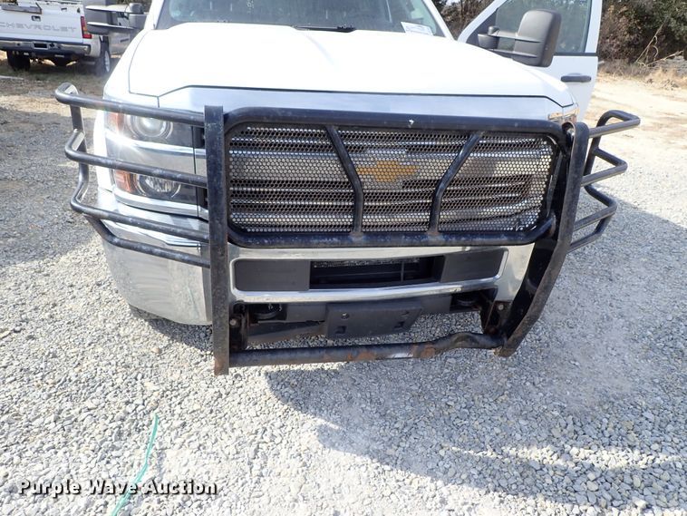 image for item DB7580 2015 Chevrolet Silverado 3500HD Crew Cab flatbed pickup truck