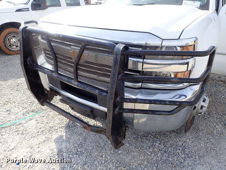 image for item DB7580 2015 Chevrolet Silverado 3500HD Crew Cab flatbed pickup truck