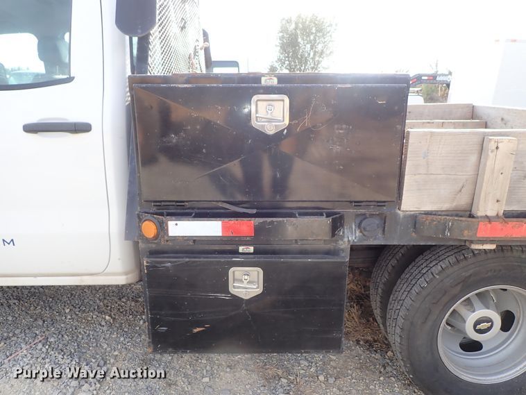 image for item DB7580 2015 Chevrolet Silverado 3500HD Crew Cab flatbed pickup truck