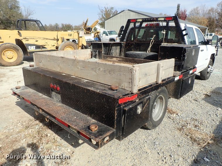 image for item DB7580 2015 Chevrolet Silverado 3500HD Crew Cab flatbed pickup truck