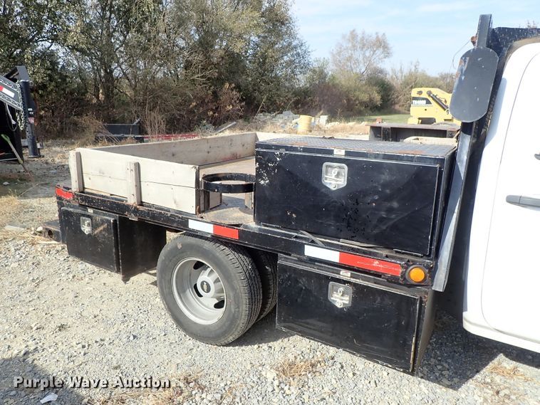 image for item DB7580 2015 Chevrolet Silverado 3500HD Crew Cab flatbed pickup truck