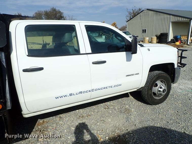 image for item DB7580 2015 Chevrolet Silverado 3500HD Crew Cab flatbed pickup truck