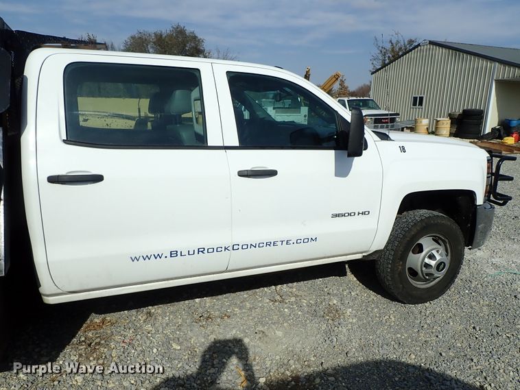 image for item DB7580 2015 Chevrolet Silverado 3500HD Crew Cab flatbed pickup truck