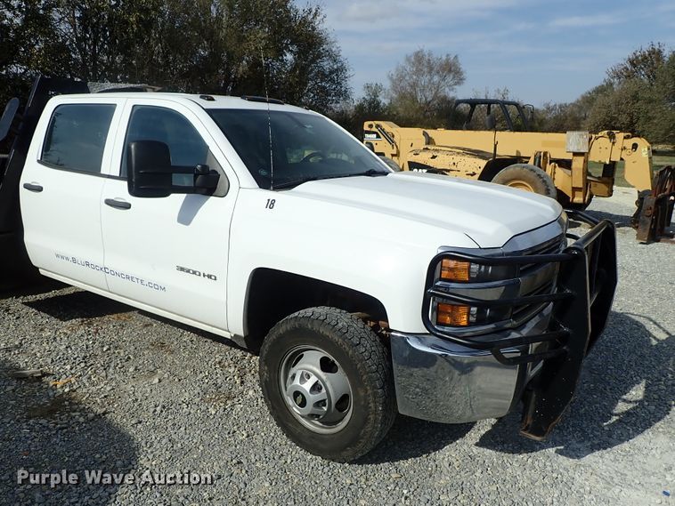 image for item DB7580 2015 Chevrolet Silverado 3500HD Crew Cab flatbed pickup truck